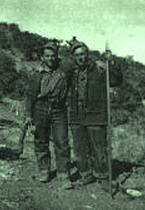 2 men standing for a photo